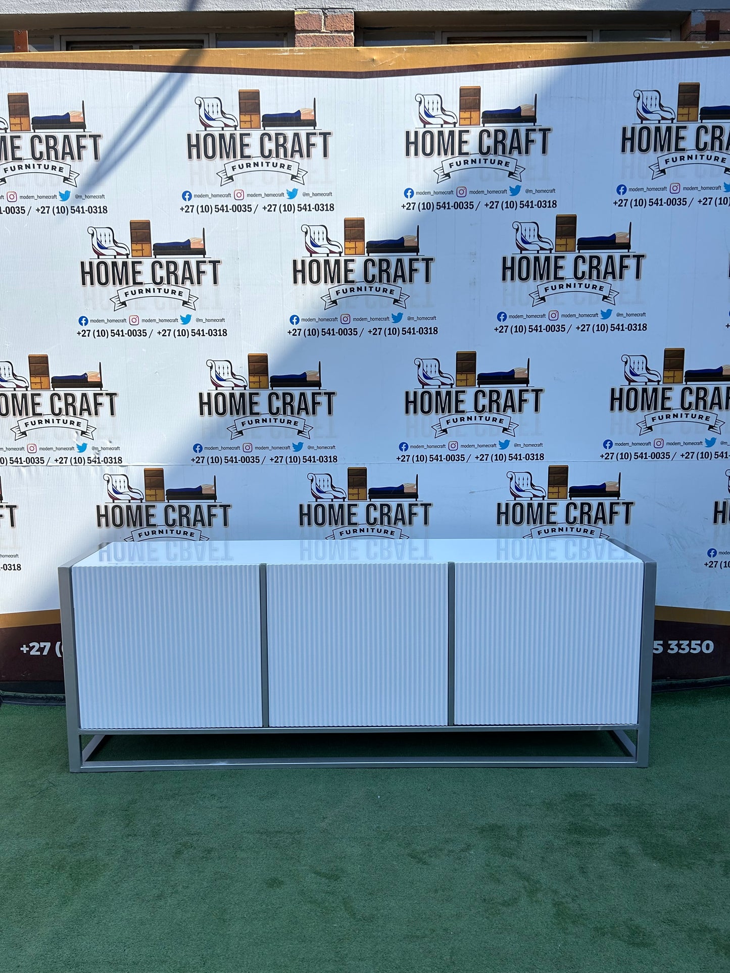 Nkele - 3 Drawer Tv Stand